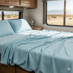 Breathable, moisture-wicking cooling sheets on an RV bed, ideal for warm weather camping.