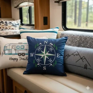 A group of custom-made RV pillows with various embroidery and designs, demonstrating personalized options for RV owners.