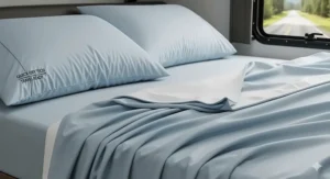 A close-up illustration of a soft microfiber RV bedding set, highlighting its lightweight, wrinkle-resistant, and quick-drying properties, ideal for life on the road.