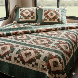 A quilted bedspread with matching pillow shams, ideal for adding warmth and style to a motorhome bedroom.