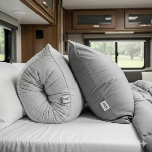 A set of two pillows with different firmness levels, suitable for various sleeping preferences in an RV camper.