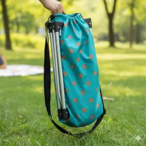 Lightweight, folded children's camping chair neatly packed into its matching carry bag, demonstrating portability.