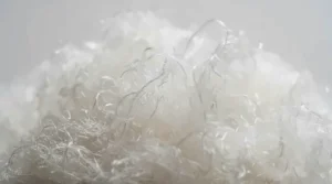 Close-up of synthetic insulation fibers inside a 3-season sleeping bag for backpacking.